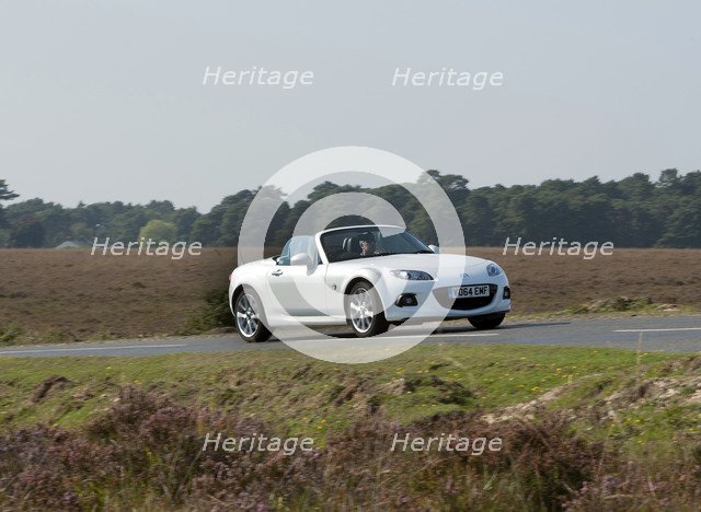 2014 Mazda MX5 Roadster Coupe Artist: Unknown.