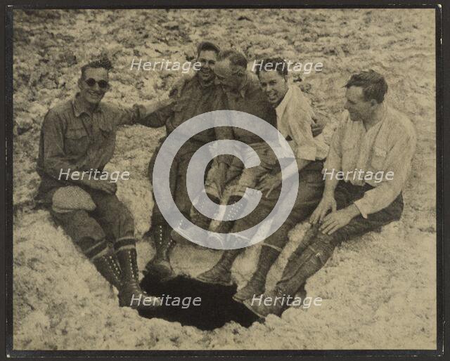 Group Portrait Seated at Mouth of Vertical Cave, San Jacinto Peak, 1930. Creator: Louis Fleckenstein.