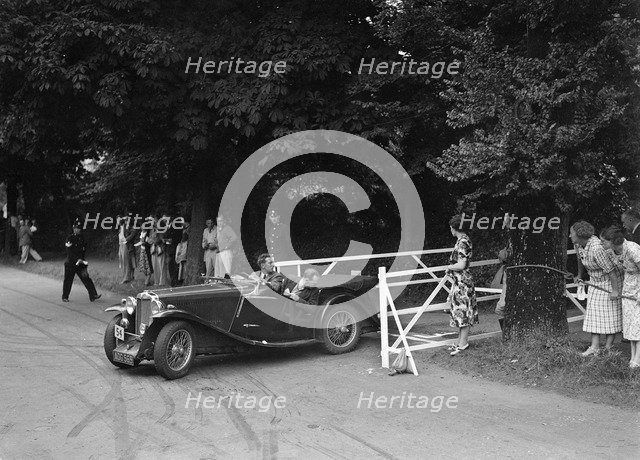 VM Roberts' MG Magnette NA, winner of a bronze award at the MCC Torquay Rally, July 1937. Artist: Bill Brunell.