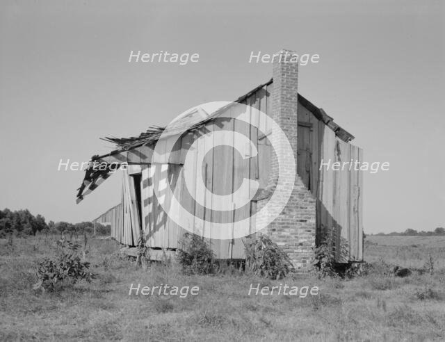 An abandoned tenant cabin of the Mississippi Delta, 1937. Creator: Dorothea Lange.