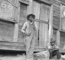 Tenant farmer and friend, Chatham County, North Carolina, 1939. Creator: Dorothea Lange.