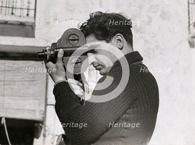Robert Capa, 1937. Creator: Taro; Gerda (1910-1937).