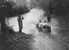 Austin Ulster competing in the JCC Lynton Trial, 1932. Artist: Bill Brunell.