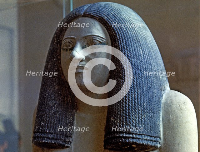 Female statue from the Tomb of SEPA, chief of the southern army, held in polychromed limestone.