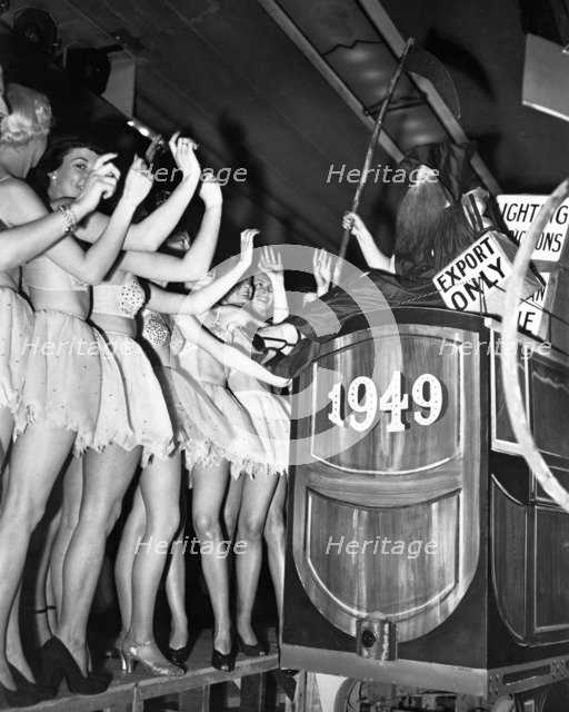 Dancers on New Year's Eve celebrations at the Trocadero Restaurant, Leicester Square, London, 1949. Artist: Unknown