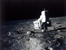 Buzz Aldrin carries out an experiment on the lunar surface, Apollo II mission, July 1969. Creator: Neil Armstrong.