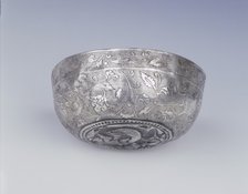 Silver bowl with animals, birds and dragon, High Tang period, China, 8th century. Artist: Unknown