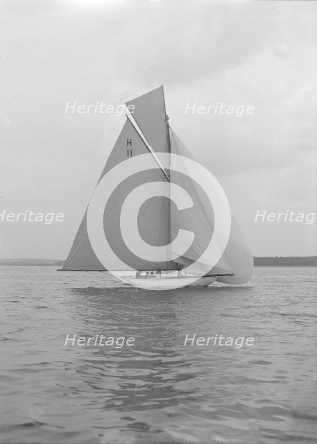 Light winds for the 8 Metre 'Ventana' (H11) sailing with spinnaker, 1912. Creator: Kirk & Sons of Cowes.