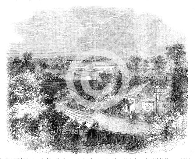 Steam locomotive approaching a bridge, 1858. Creator: Unknown.