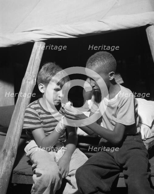 First aid at Camp Nathan Hale, Southfields, New York, 1943 Creator: Gordon Parks.