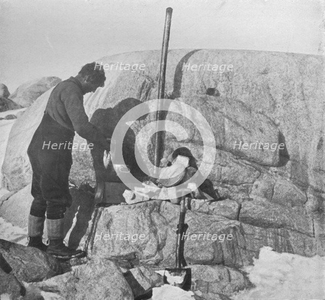 'Forde Cooking Seal-Fry on the Blubber Stove at Cape Roberts', c1911, (1913). Artist: Frank Debenham.