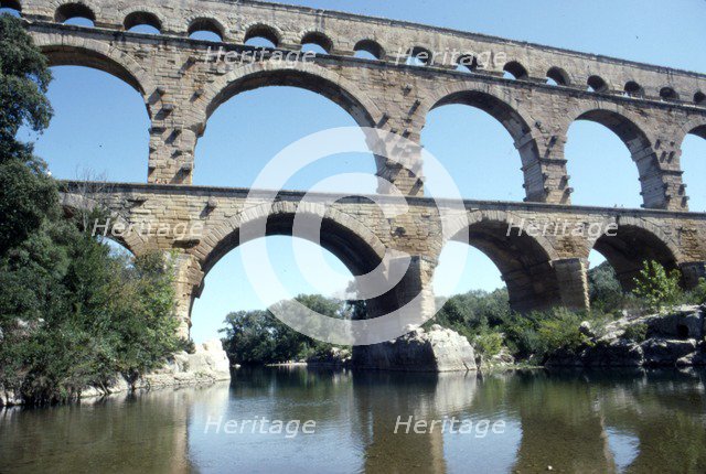 Roman aqueduct in Pont du Gard, France, 1st century. Artist: CM Dixon.