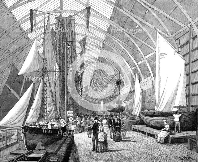 The International Fisheries Exhibition: boats and nets in the British Sea Fisheries Gallery, 1883. Creator: John Greenaway.