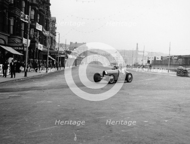 Bugatti in a race on the Isle of Man, 1933. Artist: Unknown
