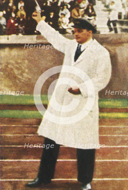 Franz Miller firing starter pistol, 1928. Creator: Unknown.