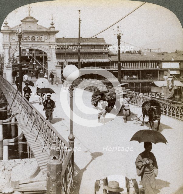 Looking west over the Kamo River (Kamogawa) at Shijo bridge, Kyoto, Japan, 1904.Artist: Underwood & Underwood