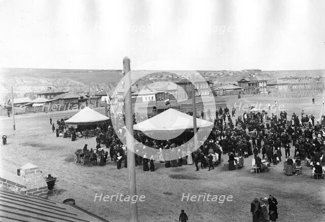 Carousels on Novobazarnaya Square, 1910-1919. Creator: N. A. Stavrovskii.