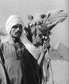 Cameldriver near the pyramids, Egypt, 1937. Artist: Martin Hurlimann