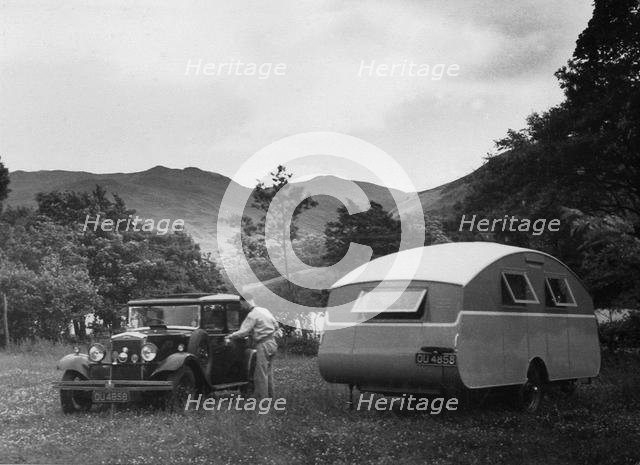 1930 Morris Oxford Six with Winchester Streamline caravan. Creator: Unknown.