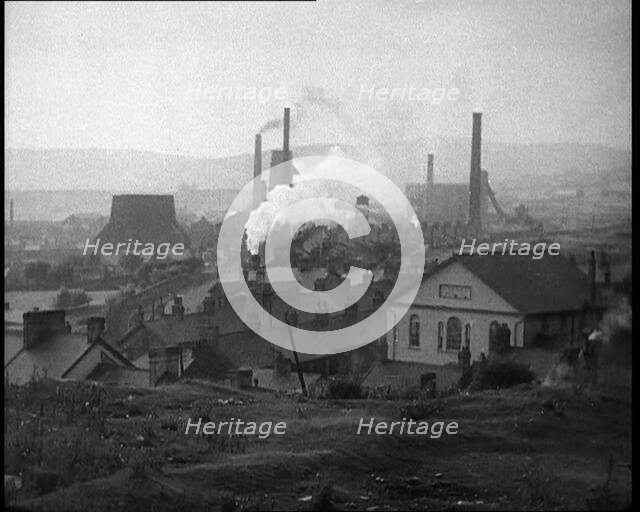 Smoke Rising from Factory Chimneys, 1933. Creator: British Pathe Ltd.
