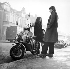 Couple with a scooter, London, 1967. Artist: Henry Grant
