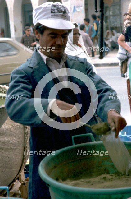 Selling henna in Gabes market. Artist: Unknown