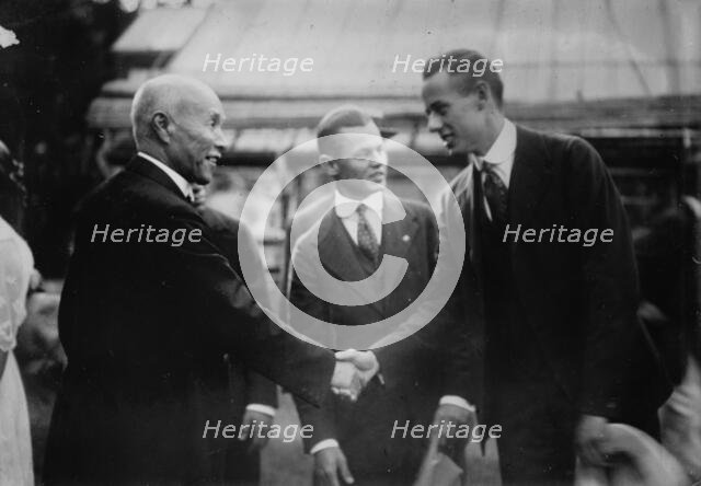 Count Okuma welcomes Paul Des Jardien of Chicago baseball team, 11/18/15, 1915. Creator: Bain News Service.