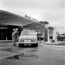 Mini on the 1959 Mobil Economy Run, re- fuelling. Creator: Unknown.