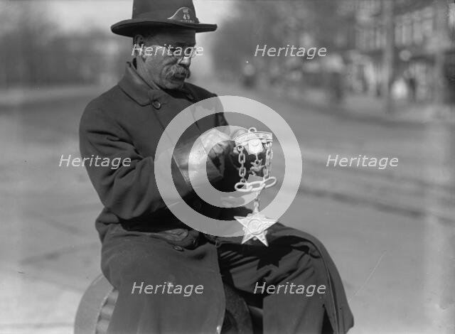 Grand Army of The Republic - G.A.R. Emblem Carved in Wood By Switchman at Peace Monument, 1917. Creator: Harris & Ewing.