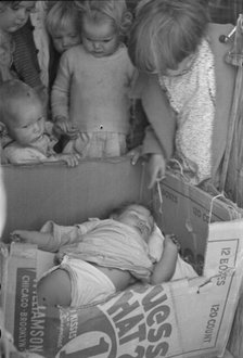 Children of migrant families in the nursery school, Kern migrant camp, California, 1936. Creator: Dorothea Lange.