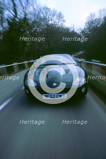 2002 Jaguar XKR coupe. Artist: Unknown.