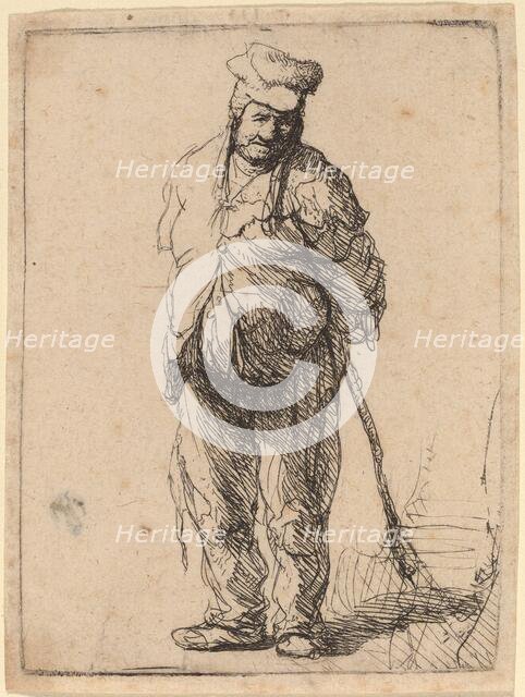 Ragged Peasant with His Hands behind Him, Holding a Stick, c. 1630. Creator: Rembrandt Harmensz van Rijn.