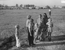 Children of migratory pea pickers in Brawley camp, California, 1939. Creator: Dorothea Lange.