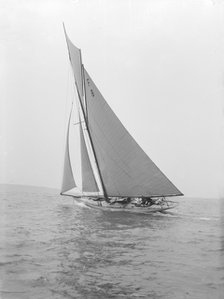 The 10 Metre class 'Pampero' (F8) sailing close-hauled, 1914. Creator: Kirk & Sons of Cowes.