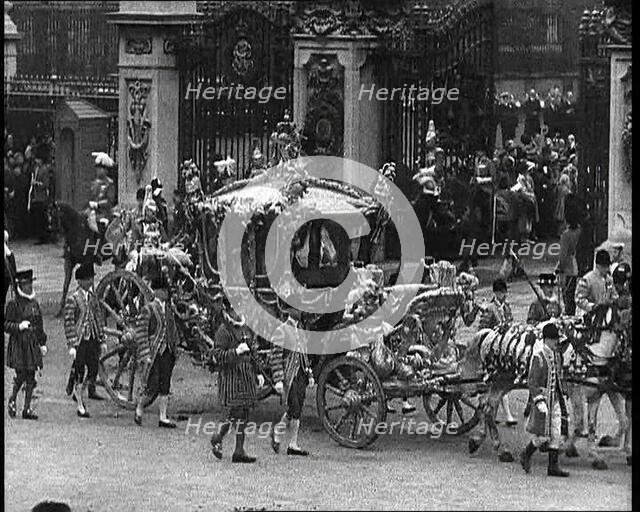 The Royal Coach, Horses, and Procession Filing Out of the Gates and Turning Left at the..., 1937. Creator: British Pathe Ltd.