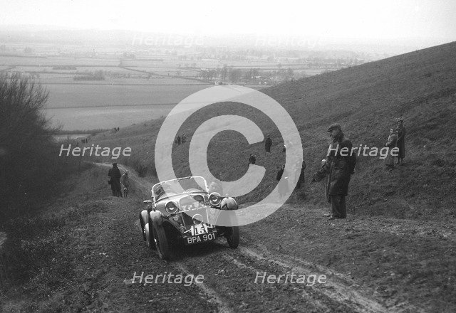 Singer Le Mans competing in a trial, Crowell Hill, Chinnor, Oxfordshire, 1930s. Artist: Bill Brunell.
