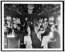 Dining car on a deluxe overland limited train, between 1910 and 1920. Creator: Unknown.