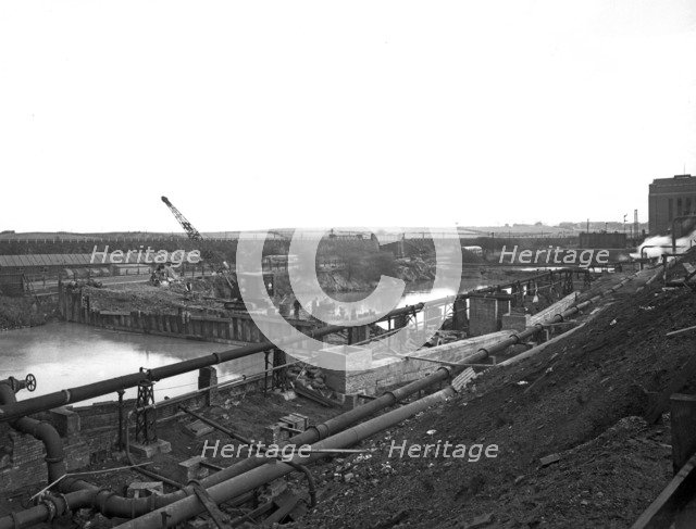 Construction of the reservoir, Manvers Main Colliery, Wath upon Dearne, South Yorkshire, 1955. Artist: Michael Walters