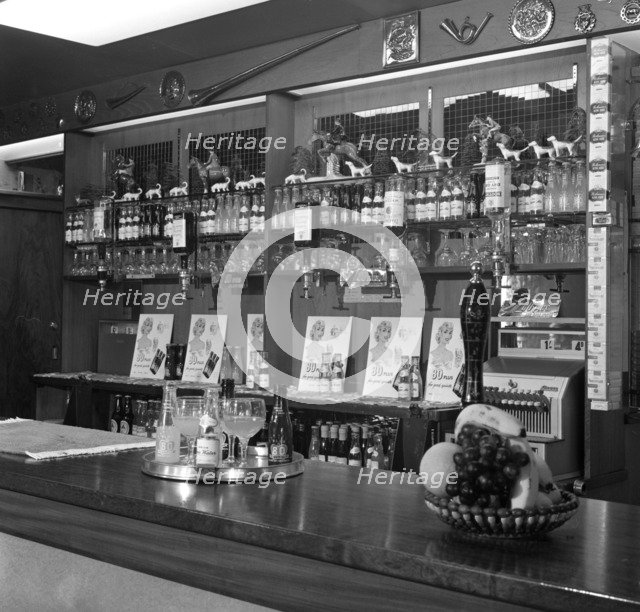 Bar of the Cavalier pub, Ravenfield, near Rotherham, South Yorkshire, 1963. Artist: Michael Walters