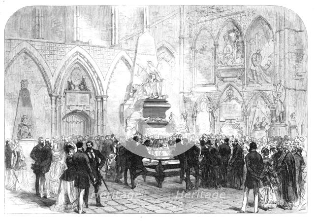 The grave of Charles Dickens in Poets' Corner, Westminster Abbey, 1870. Creator: Unknown.