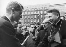 Robert Kennedy and his wife going to Sunday survice in Cologne Cathedral, West Germany, 1962. Artist: Unknown