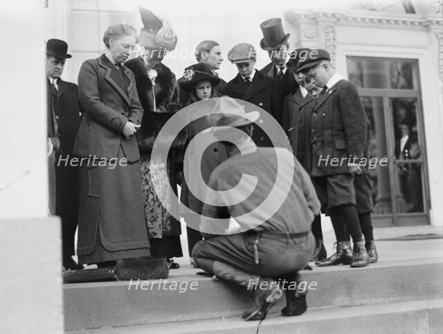 Boy Scouts - Visit of Sir Robert Baden-Powell To D.C. Making Fire; Mrs. Taft Watching, 1911. Creator: Harris & Ewing.