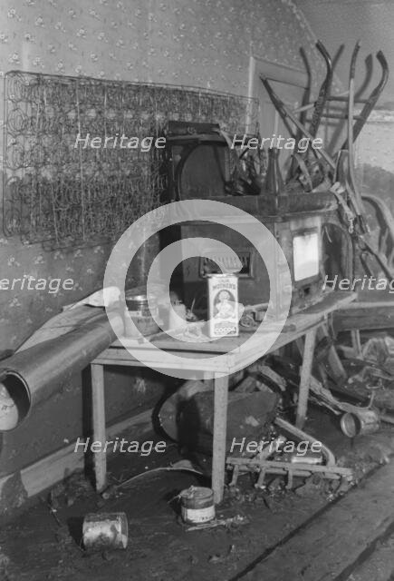 Interior of a farmhouse near Ridgeley, Tennessee, after the 1937 flood waters had subsided, 1937. Creator: Walker Evans.