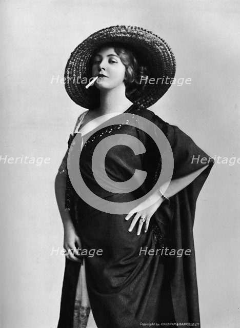 'Woman Smoking', 1917. Artist: Foulsham and Banfield.