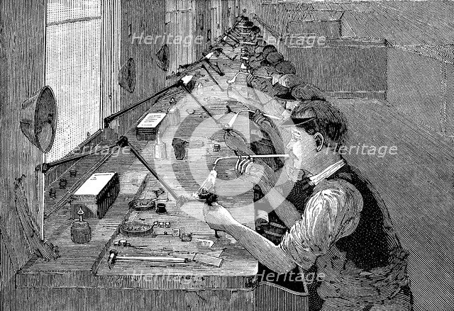 Soldering bicycle parts in an American factory, c1900. Artist: Unknown