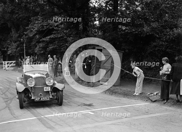 Bentley of FE Elgood, winner of a premier award at the MCC Torquay Rally, July 1937. Artist: Bill Brunell.