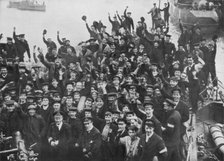 The crew of HMS 'Vindictive' celebrating the Zeebrugge Raid on 23 April 1918. Artist: Unknown