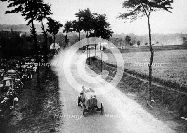 Alessandro Cagno driving his Itala, French Grand Prix, Dieppe, 1908. Artist: Unknown