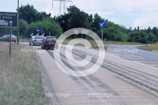 Tyre skidmarks on road surface. Artist: Unknown.