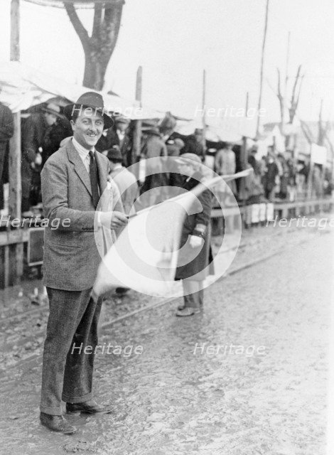 Carlo Masetti waving a flag. Artist: Unknown